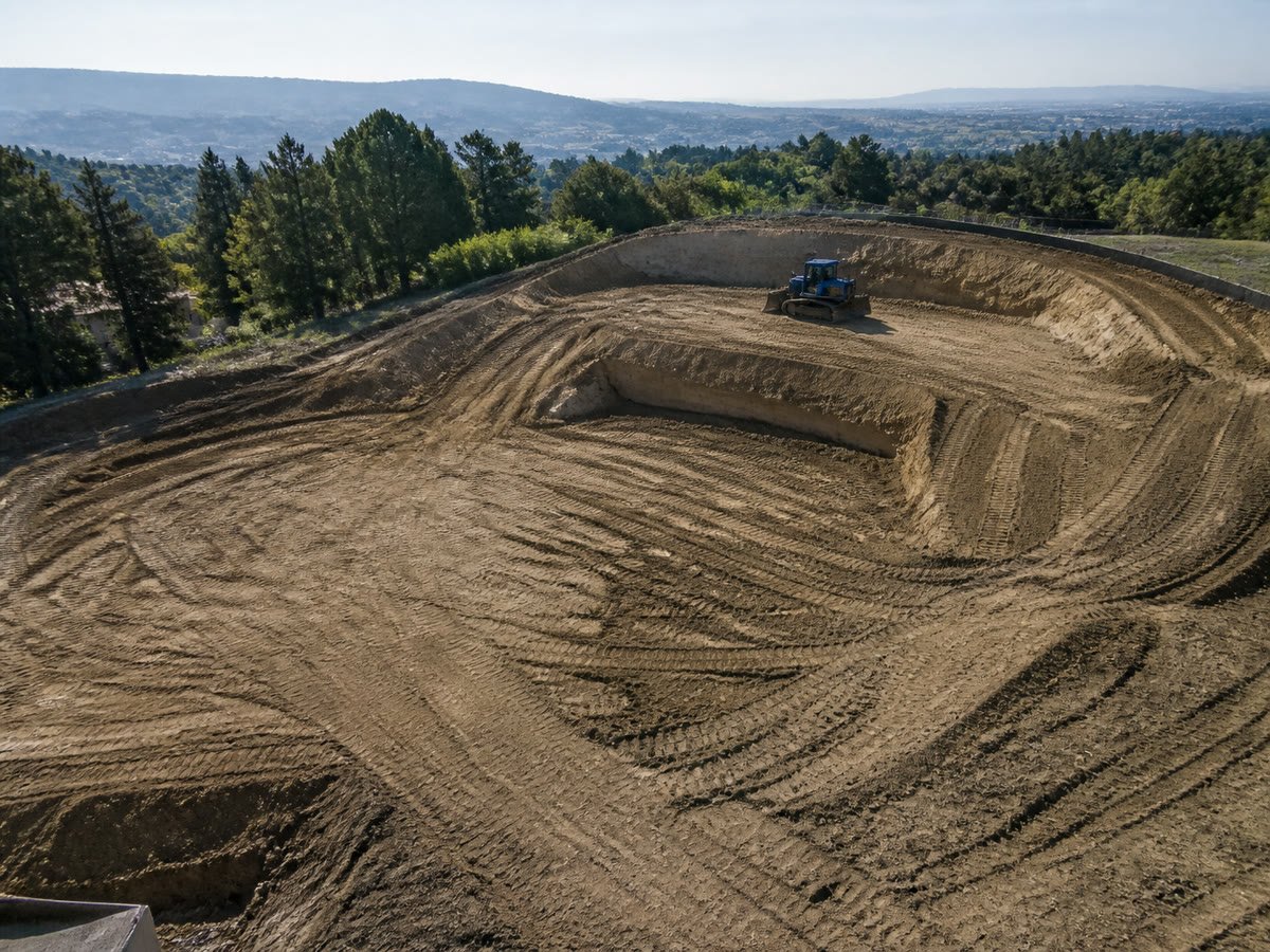 Balanced cut and fill site with gentle terraces and stable slopes