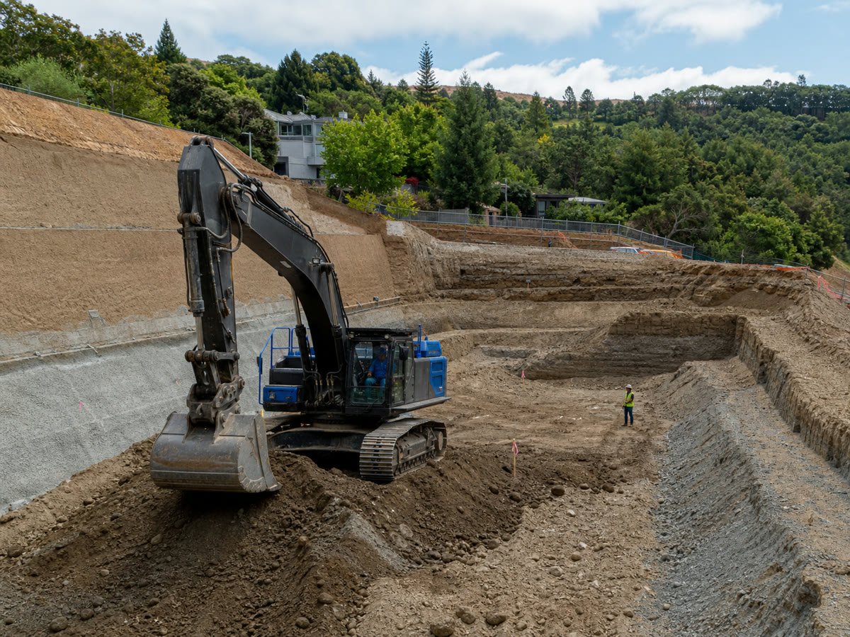 Stepped basement excavation cut into an East Bay hillside