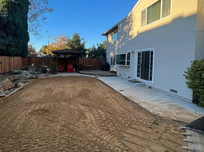 Backyard graded flat and cleared, ready for the next build
